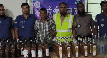 দেওয়ানগঞ্জে পুকুরের কচুরিপানার নিচ থেকে ৮৮ বোতল ভারতীয় মদ উদ্ধার আটক-১